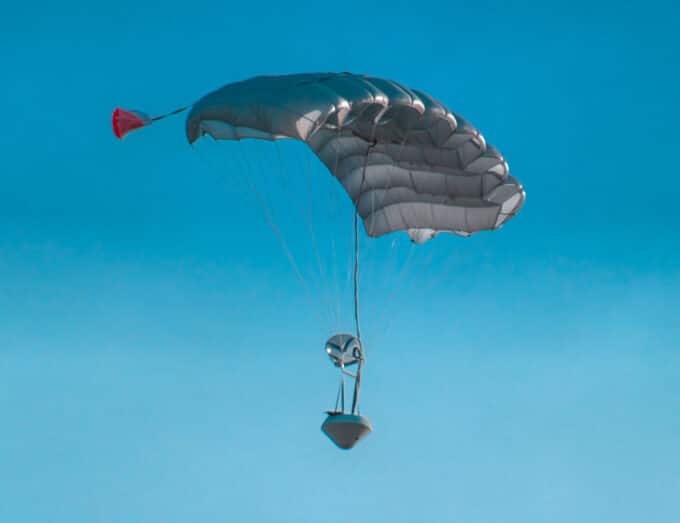 RED 25 prototype payload return capsule descends in precision landing test